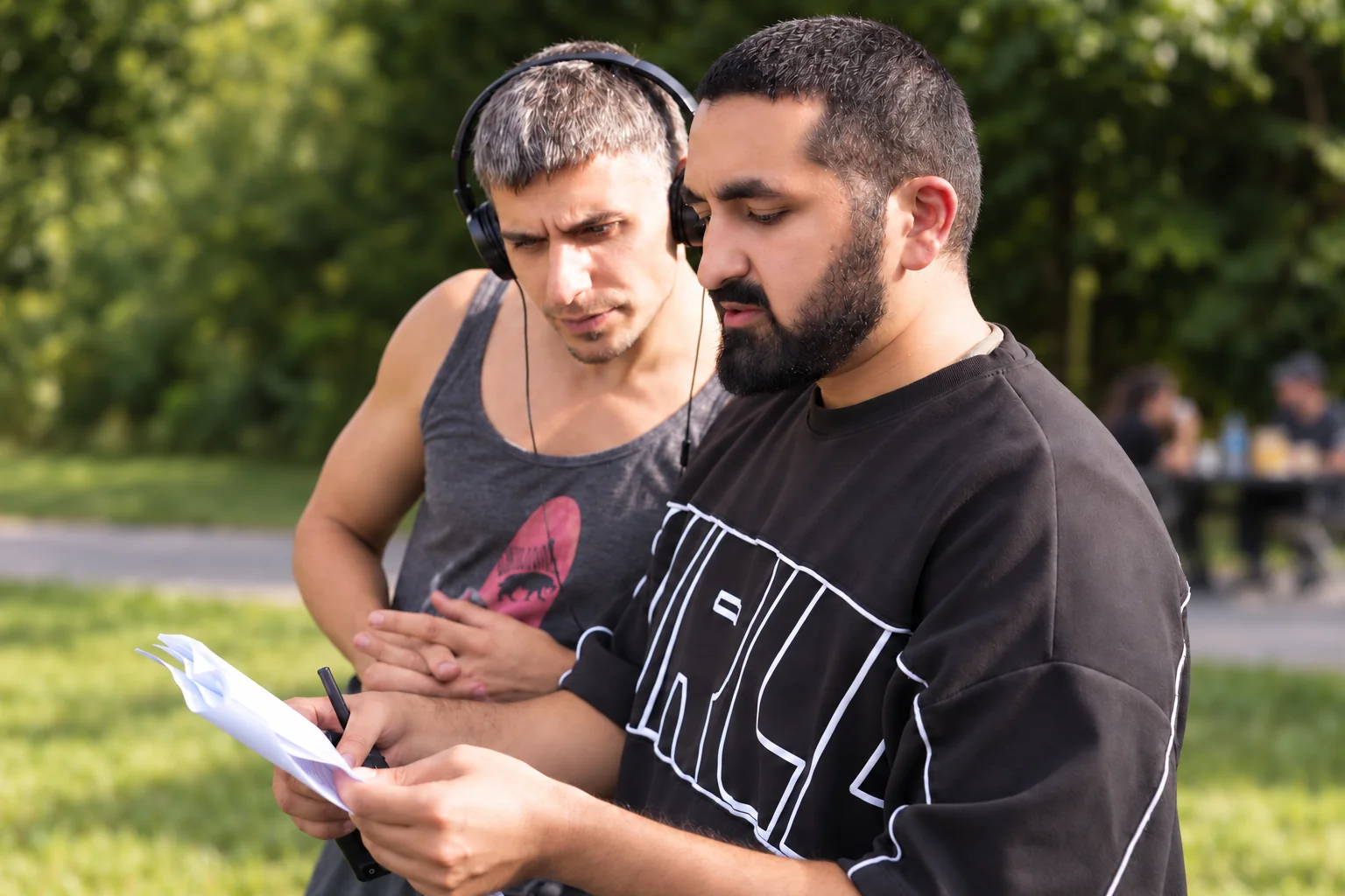 Moonchild team reviewing the plan on location